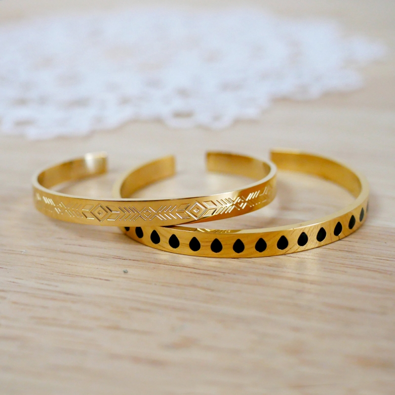 Bracelet articulé ajouré en or jaune 18k